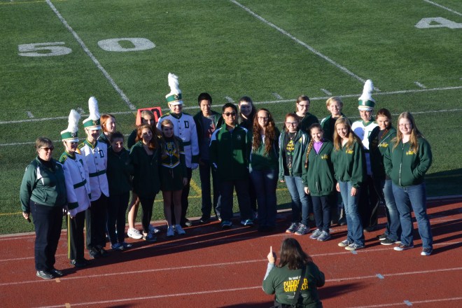 DHS Chamber Singers prepare to sing our National Anthem at the start of Marching Band Showcase 2015